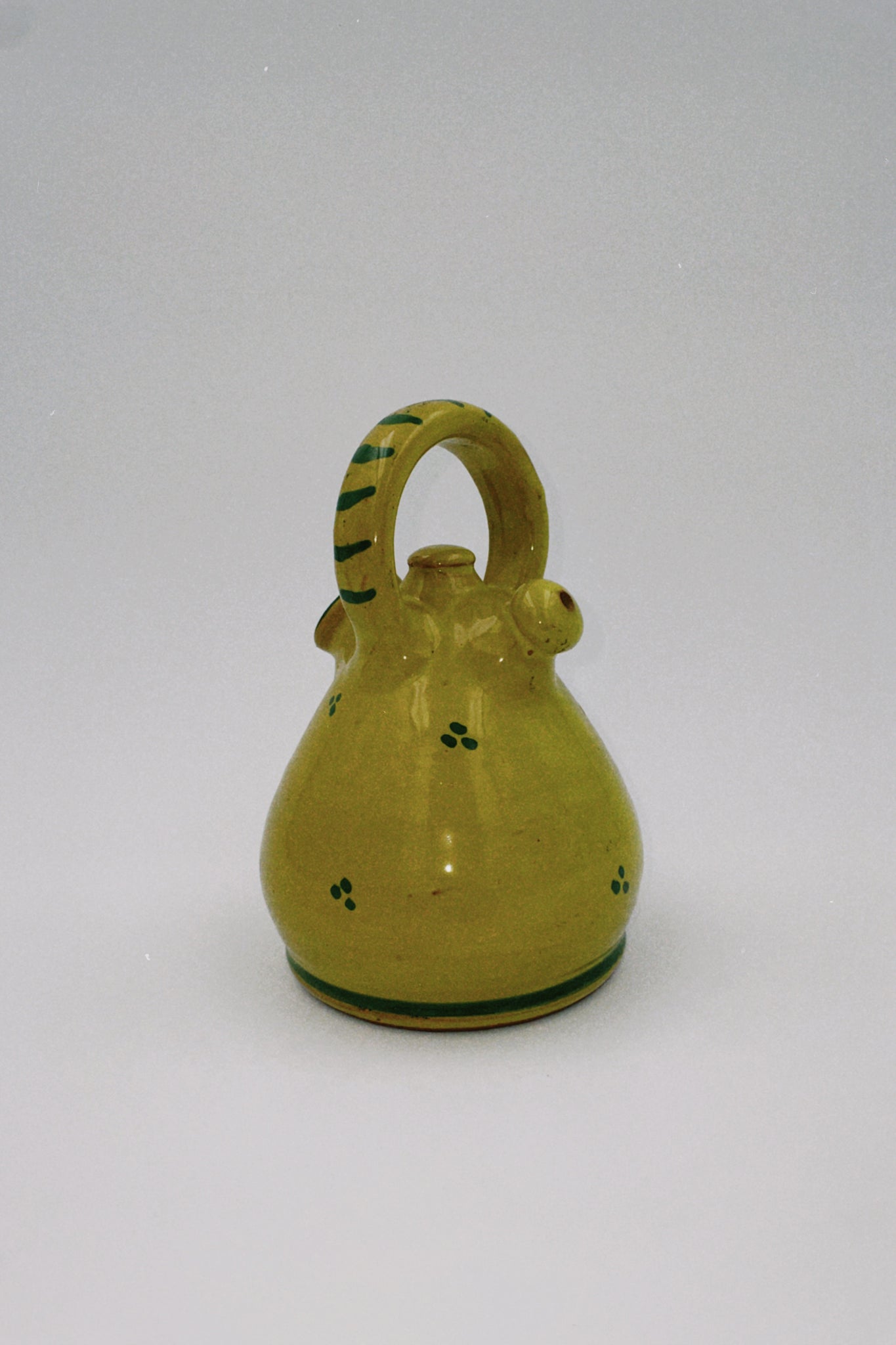 Yellow and Green Ceramic Jug